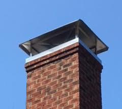 masonry chimney with metal chimney cap