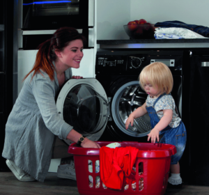 mother and child doing laundry