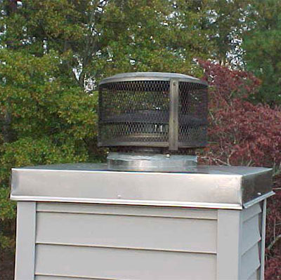 After - New Stainless Rust Proof Chase Cover in galvanized stainless steel with chimney cap and animal guard.